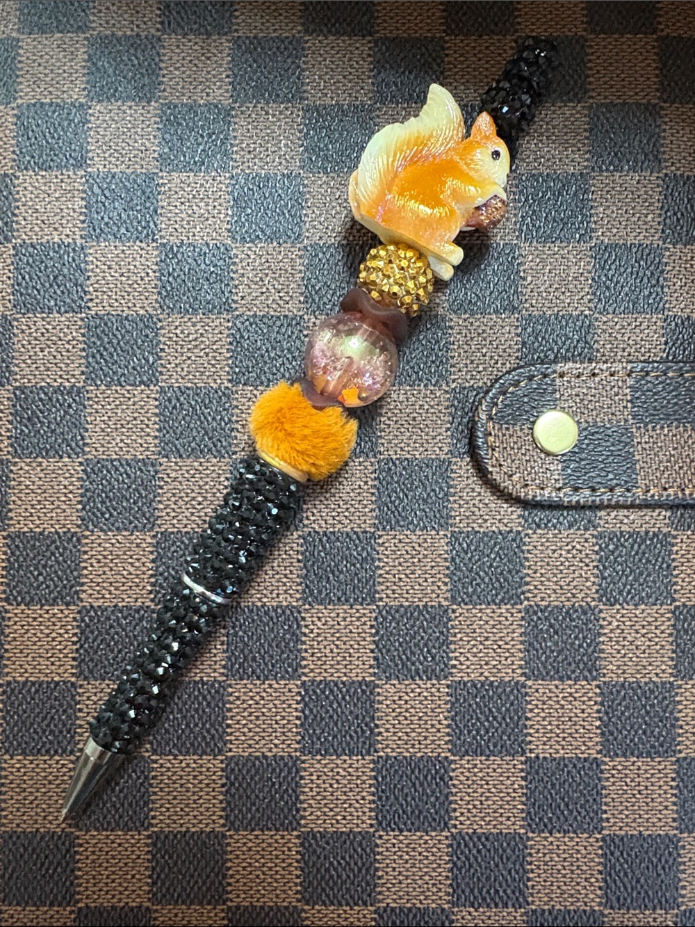 Handcrafted Black Beaded Pen with Orange Squirrel Accent